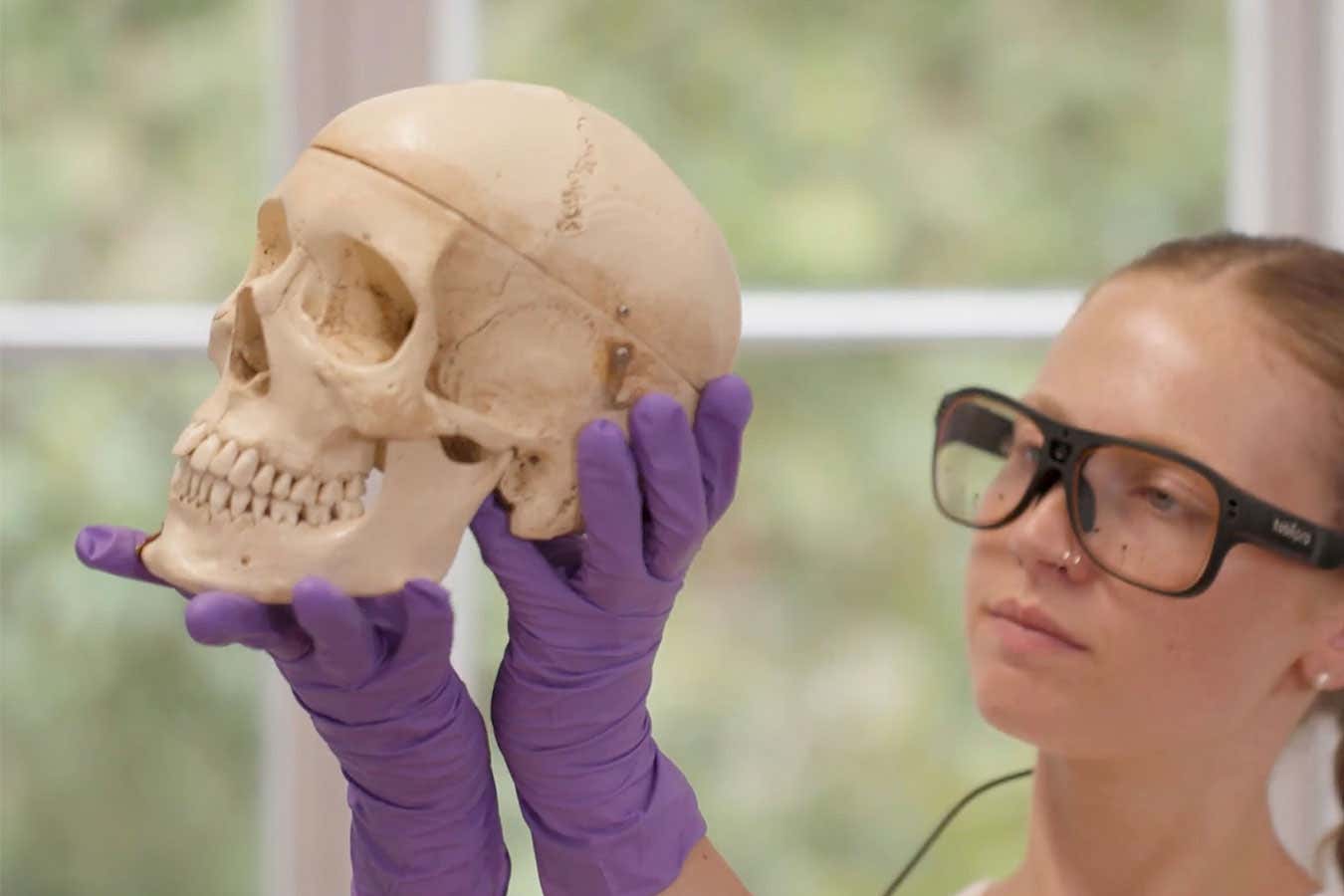 AI eye technology worn by Julie Hoeflinger, analysing a skull