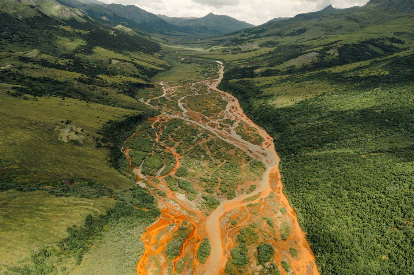 Taylor Roades: Rust River Earth Photo 2024 Shortlisted Entry 2023 was the hottest year on global record and the Arctic is disproportionately affected by these elevated temperatures. The remote Western Brooks Range of North West Alaska has recorded a 2.4 degree increase in temperature since 2006. Permafrost, the layer of soil that remains frozen throughout the year is thawing at an unprecedented rate, exposing the bedrock and all metals that have been frozen within it, to the elements. Tukpahlearick Creek and its tributaries are now flowing bright orange with oxidized iron and sulphuric acid. The change to water quality, and risks associated with metals in the water pose dire threats to ecosystems downstream that rely on these waters, and are symbolic of the far reaching consequences of climate change.