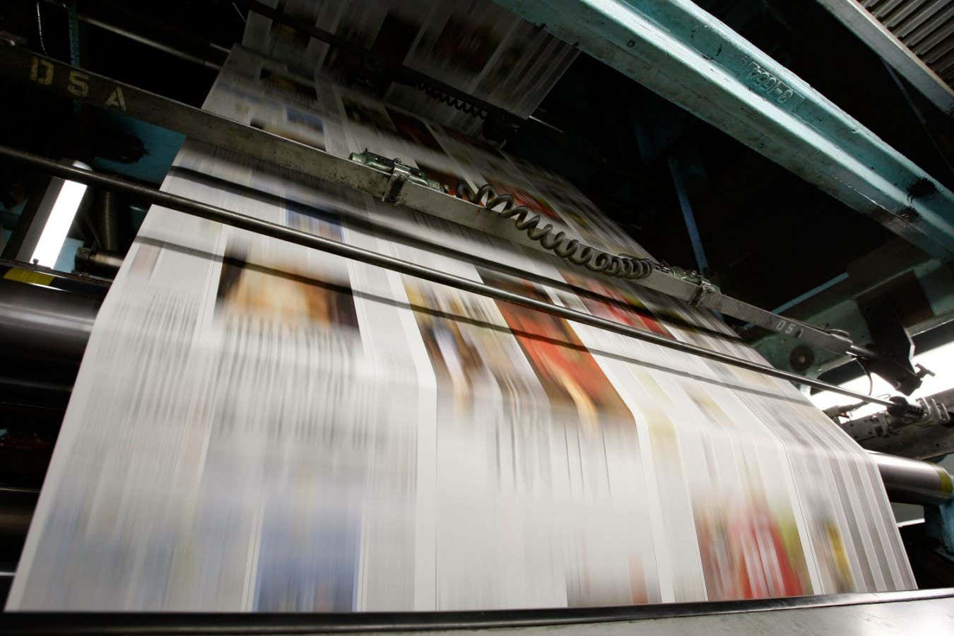 SAN FRANCISCO - SEPTEMBER 20: Freshly printed copies of the San Francisco Chronicle run through the printing press at one of the Chronicle's printing facilities September 20, 2007 in San Francisco, California. Newspaper sales in the U.S. continue to slide as people turn to the internet and television for their news. The Chronicle saw its circulation plunge more than 15 percent in 2006 to 398,000 during the week which has hurt newspaper vendor Rick Gaub's business. Unable to sell as many papers as he used to, Gaub is looking for a new way to earn money after selling papers for 42 years. (Photo by Justin Sullivan/Getty Images)